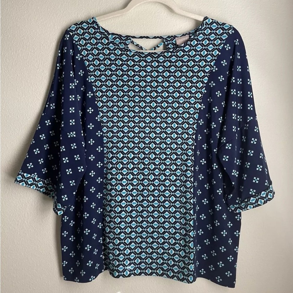 Chicos Size 2 Blue Diamond Geo Print Cross Back Jersey Knit Slinky Stretch Top